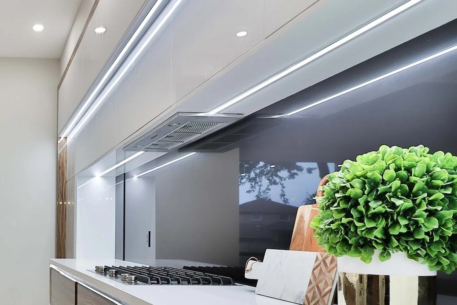 a luxury kitchen space with under-cabinet LED luminaires