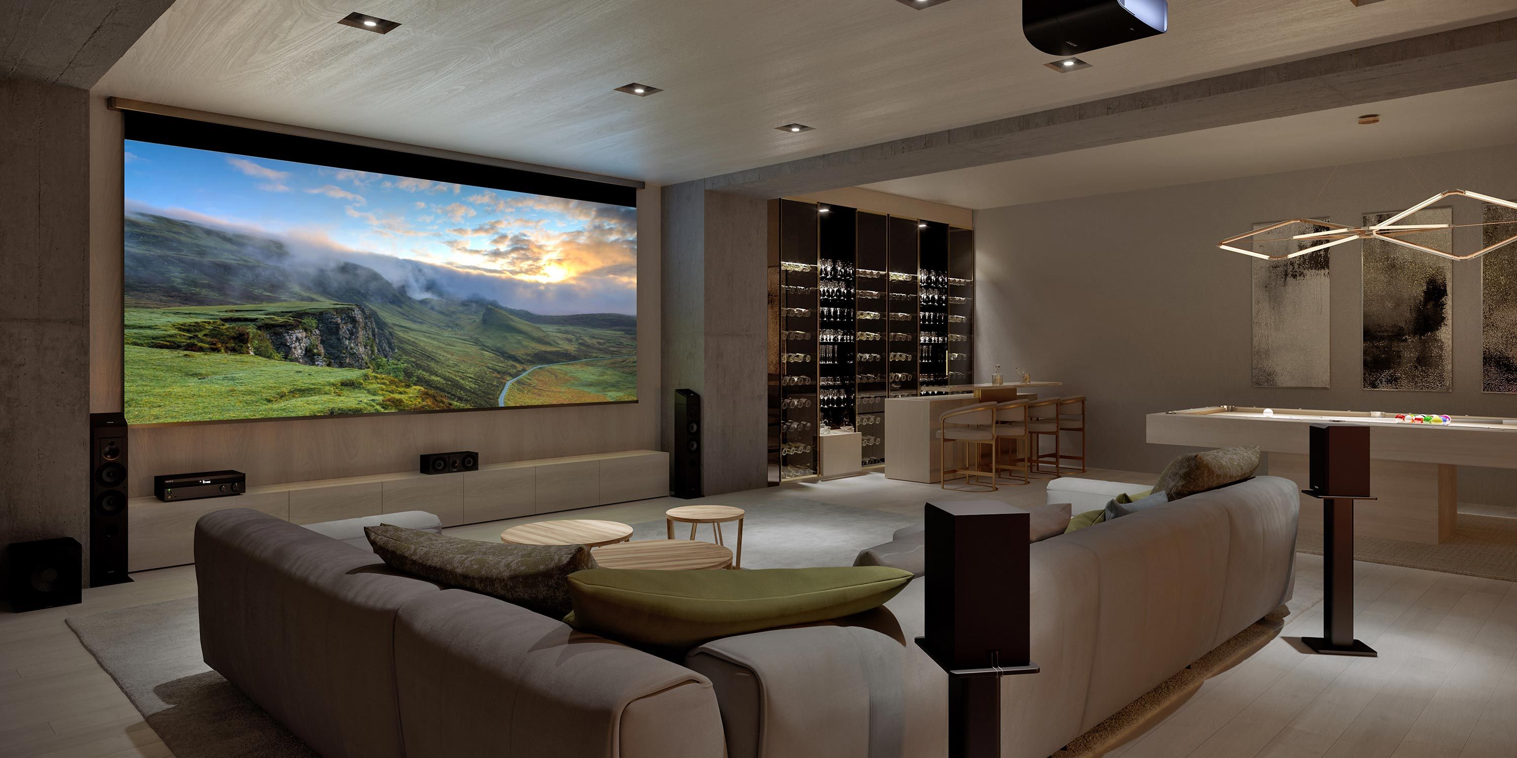 Modern entertainment room with a large screen, cozy seating, and a stylish bar area.