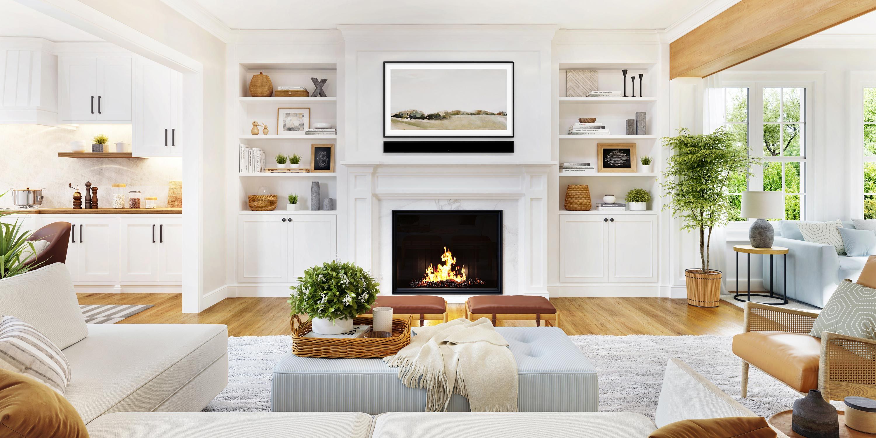 Bright and inviting family room with a fireplace, surrounded by built-in shelves and cozy seating.